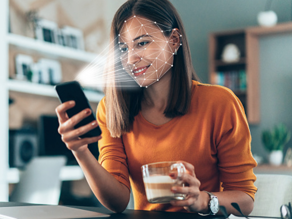 woman completing facial scan